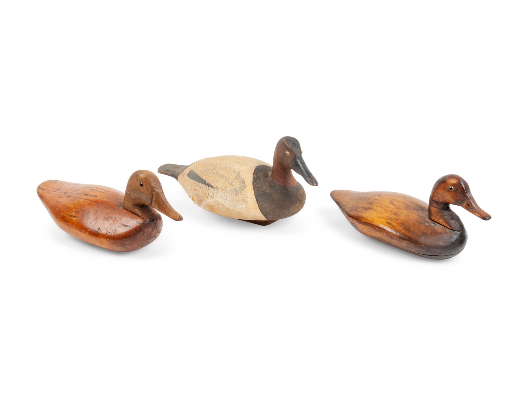 Five Carved and Polychrome Painted Duck Decoys