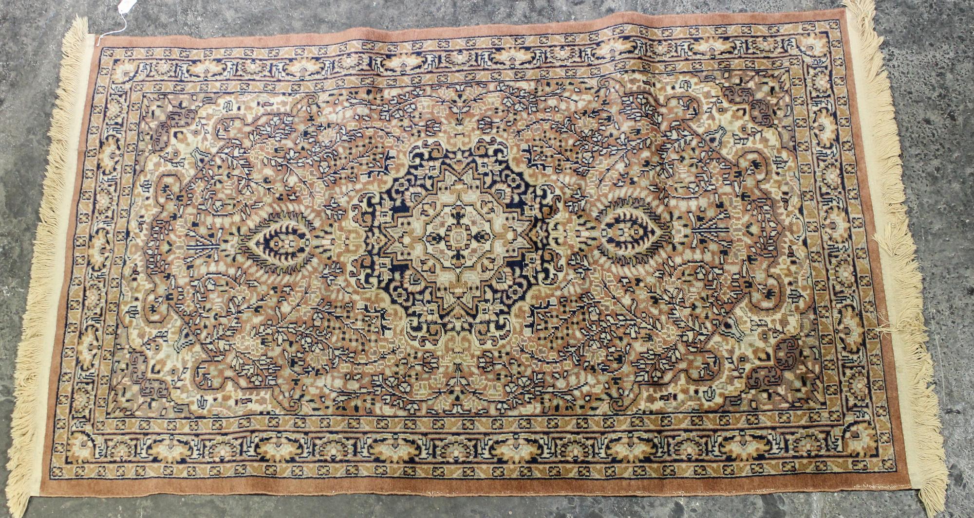 A Persian Wool and Silk Rug 5 feet 2 inches x 3 feet 1 inch. — SECOND HALF 20TH CENTURY