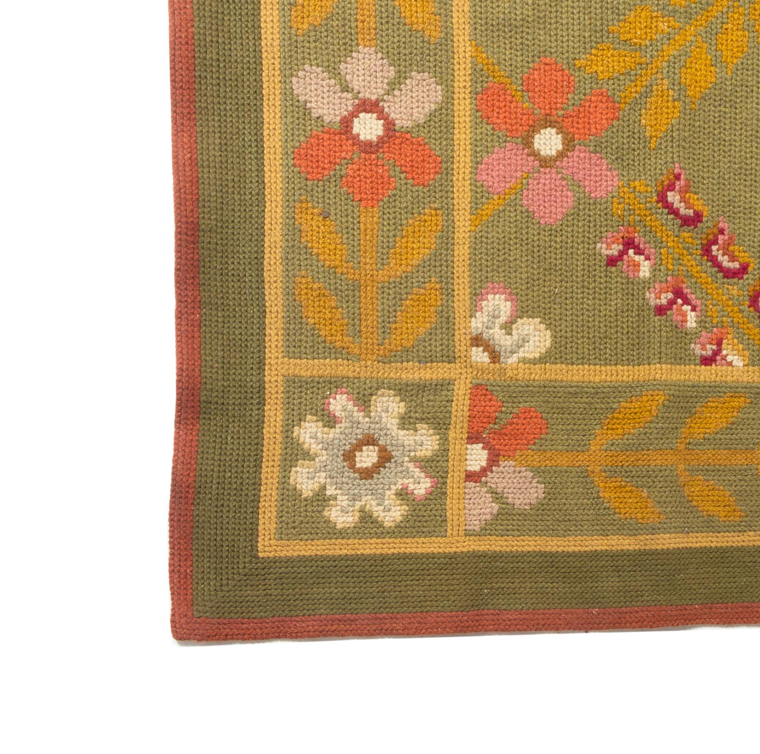 A Continental Needlepoint Rug