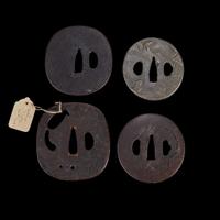 Group of twelve assorted Japanese iron tsuba