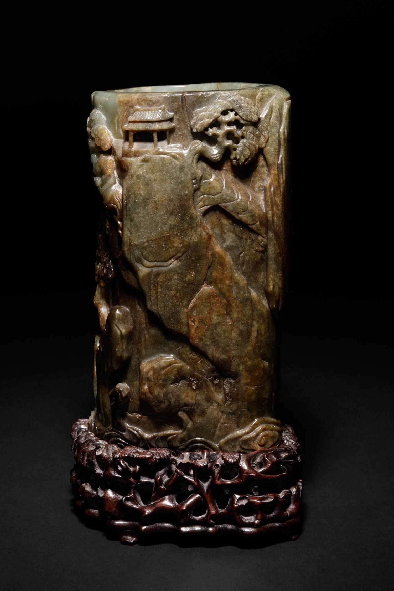 A Carved Celadon and Russet Jade Brush Pot and Stand, Bitong