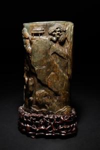 A Carved Celadon and Russet Jade Brush Pot and Stand, Bitong