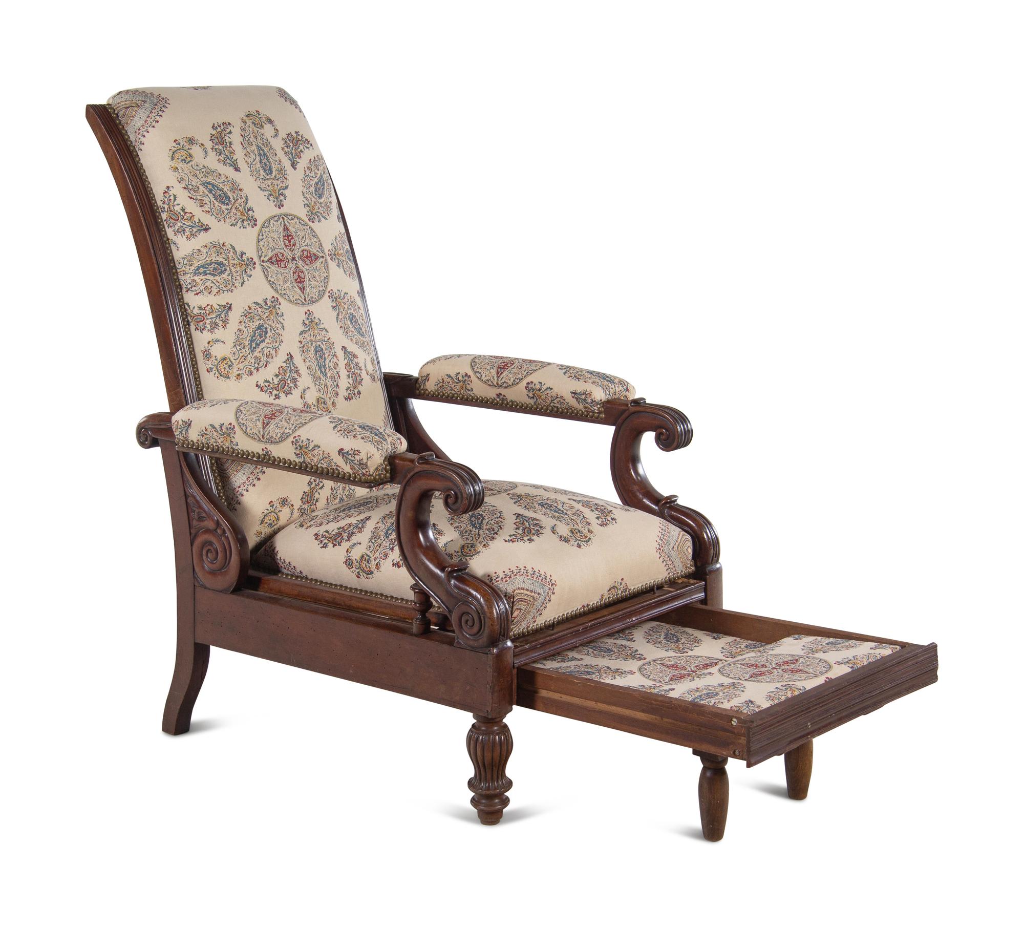 A Mahogany Reclining Armchair with Pull-Out Footrest