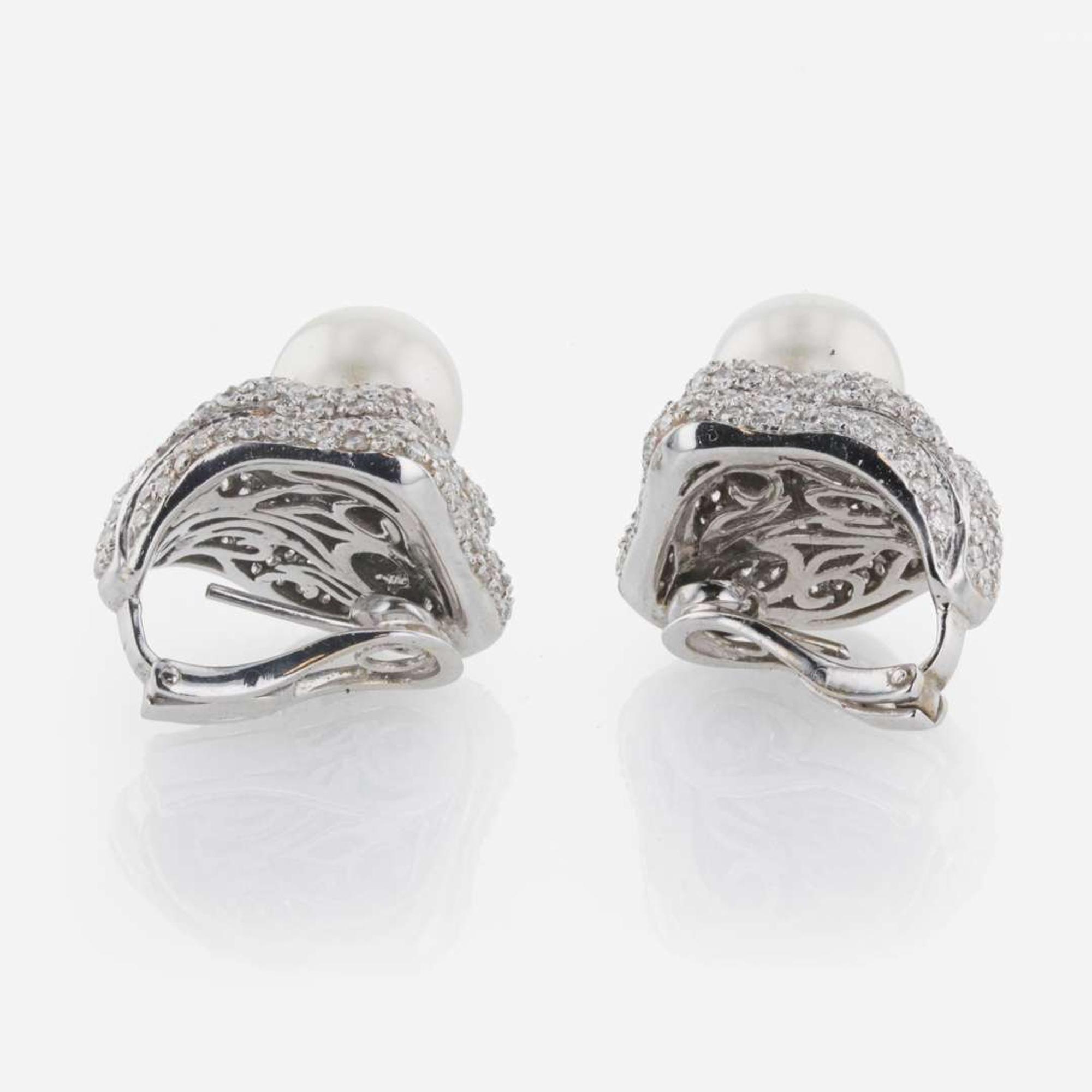 A Pair of 18K White Gold, Diamond, and Pearl Ear Clips