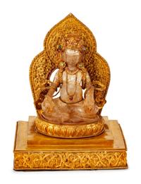 A Chinese Rock Crystal Figure of a Seated Deity