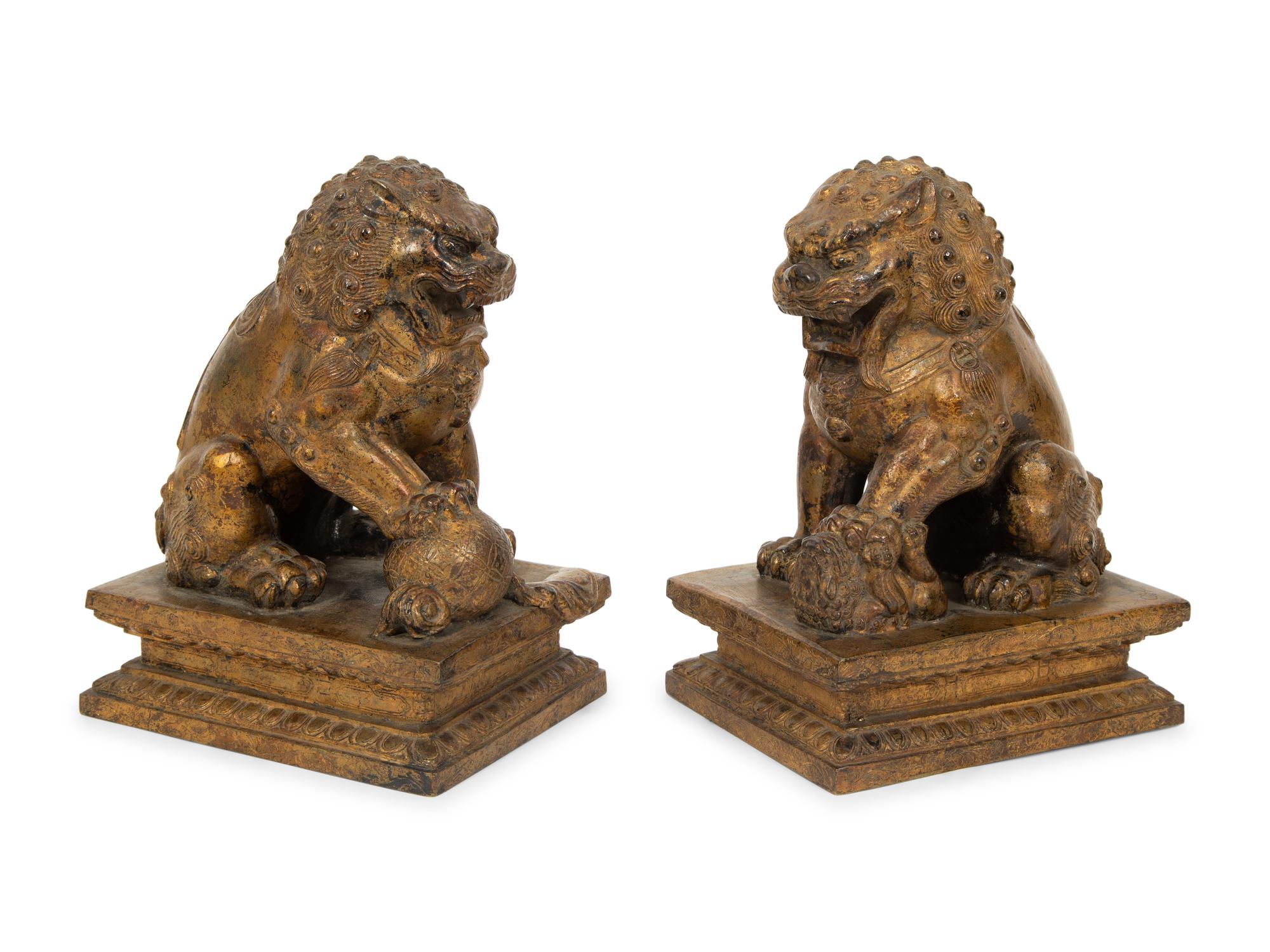 A Pair of Gilt Bronze Fu Lions