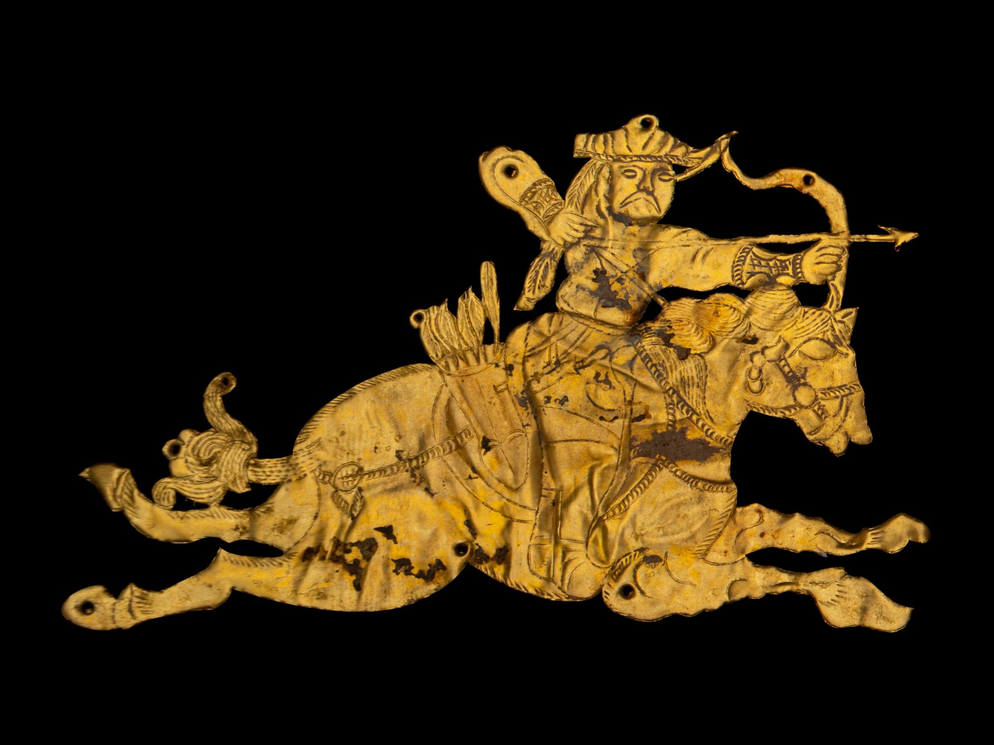 A Gold 'Equestrian' Ornament