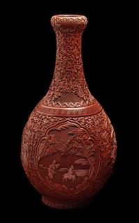 A Chinese Carved Red Lacquer Bottle Vase