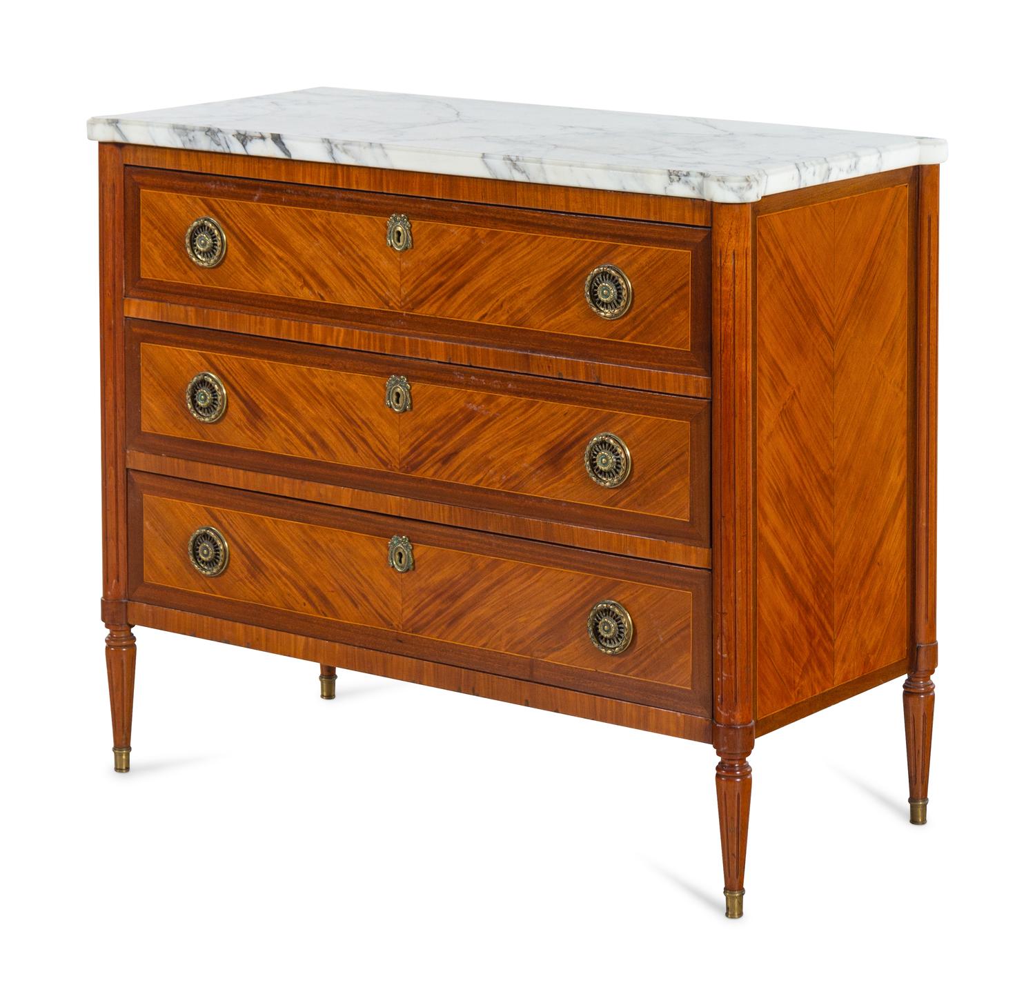 A Louis XVI Style Mahogany and Satinwood Marble-Top Commode