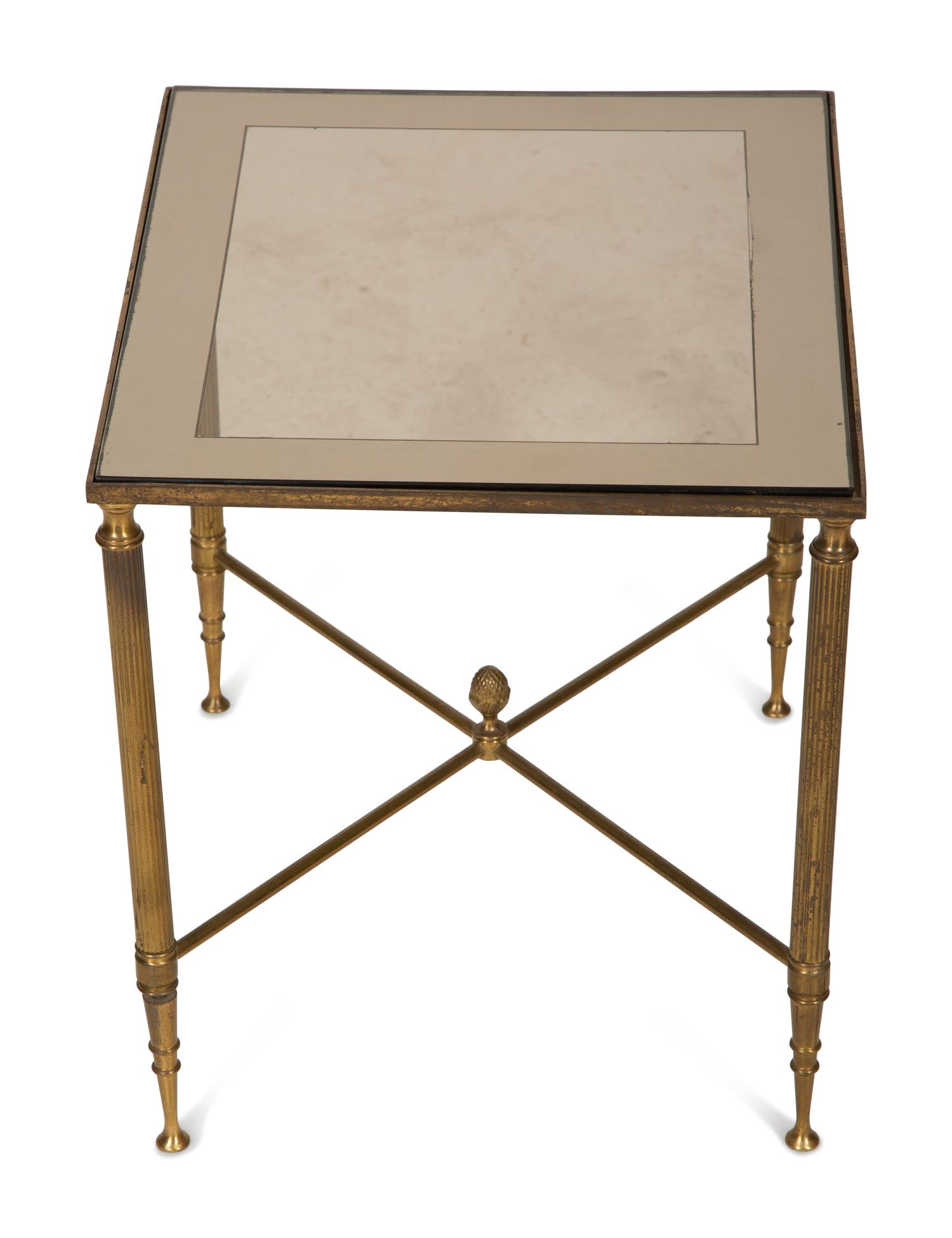 A Set of Three Gilt Metal Nesting Tables in the Style of Maison Jansen