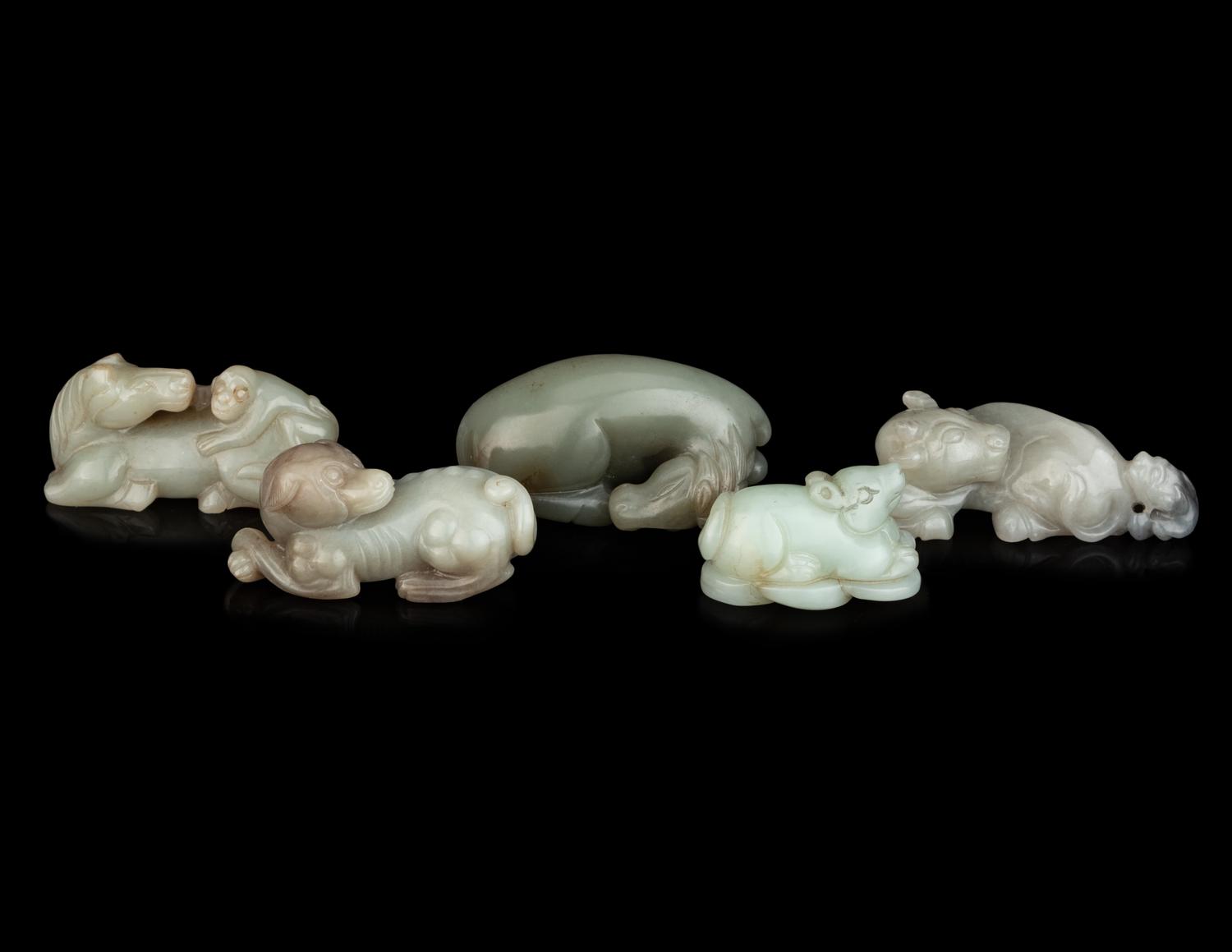Five Chinese Carved Celadon Jade Figures of Recumbent Animals