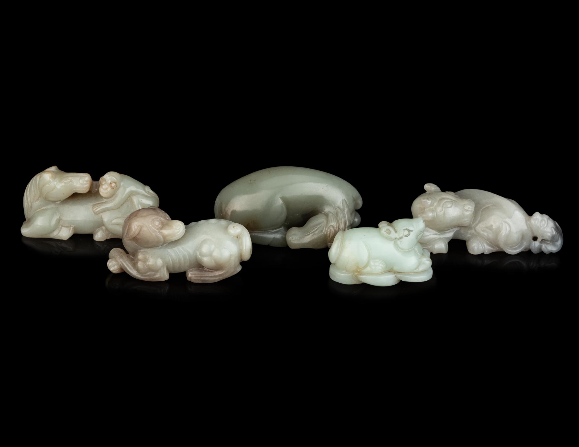 Five Chinese Carved Celadon Jade Figures of Recumbent Animals