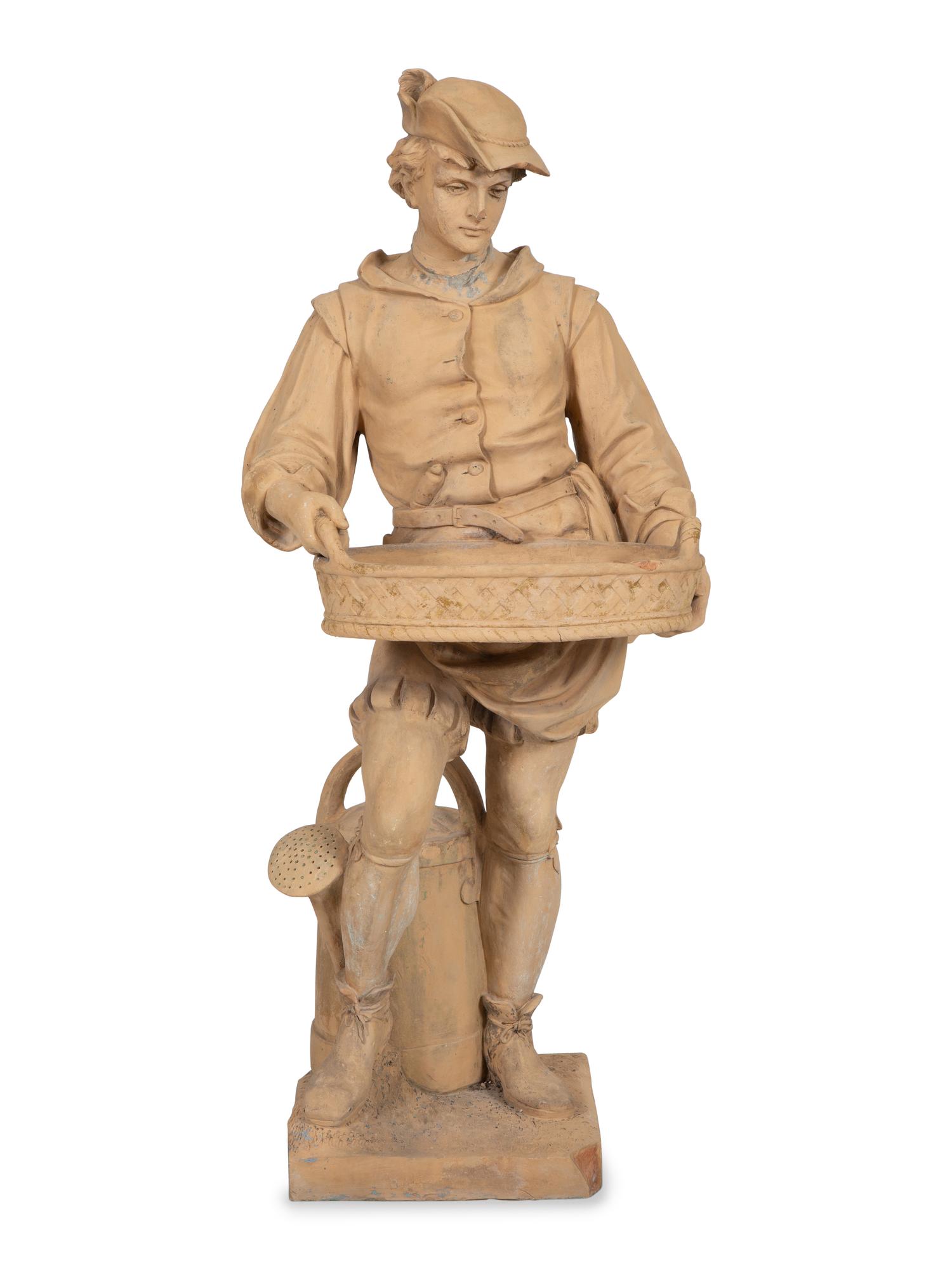 A Terra Cotta Figural Jardinière