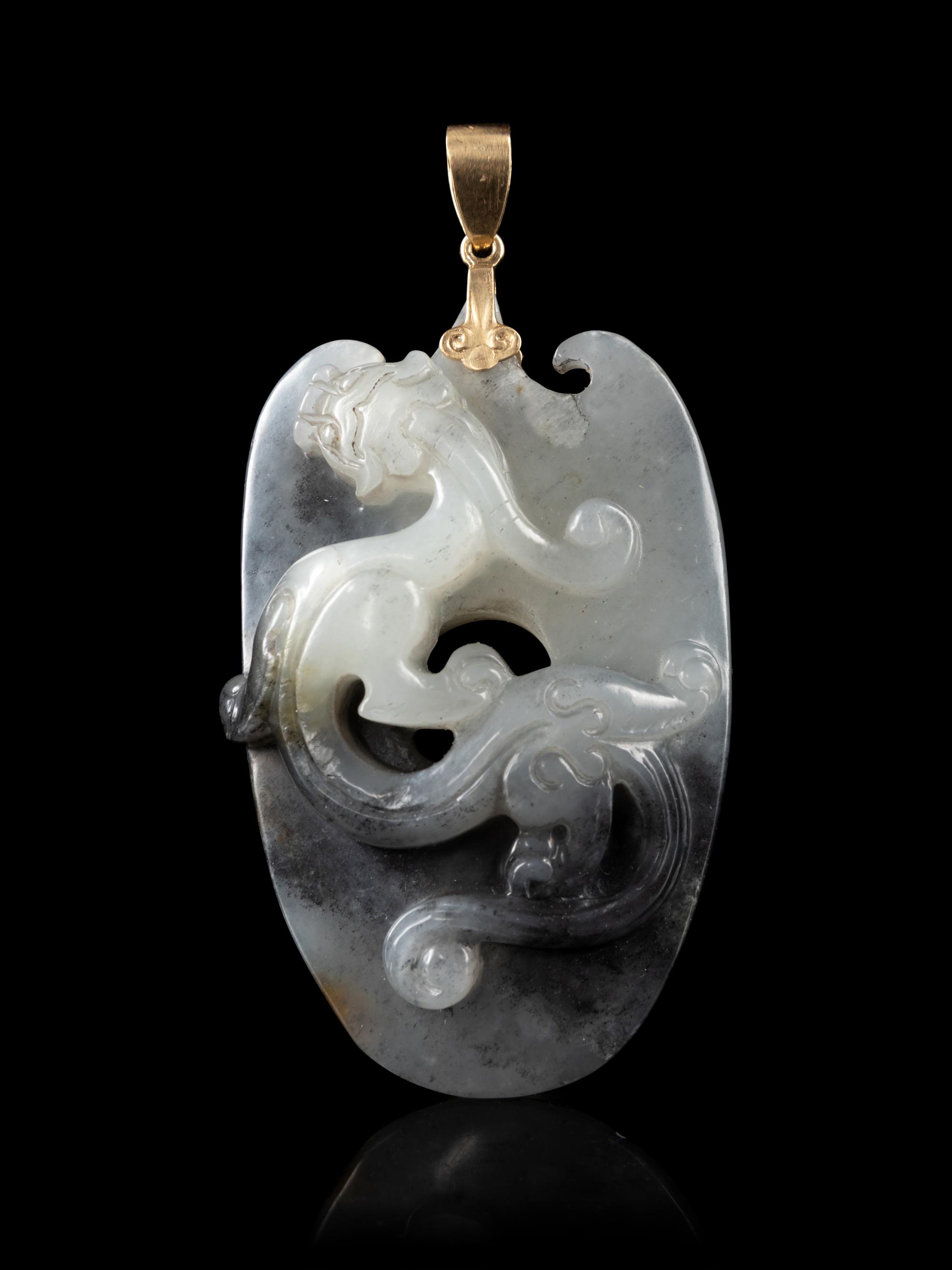 A Grey and Black Jade Pendant