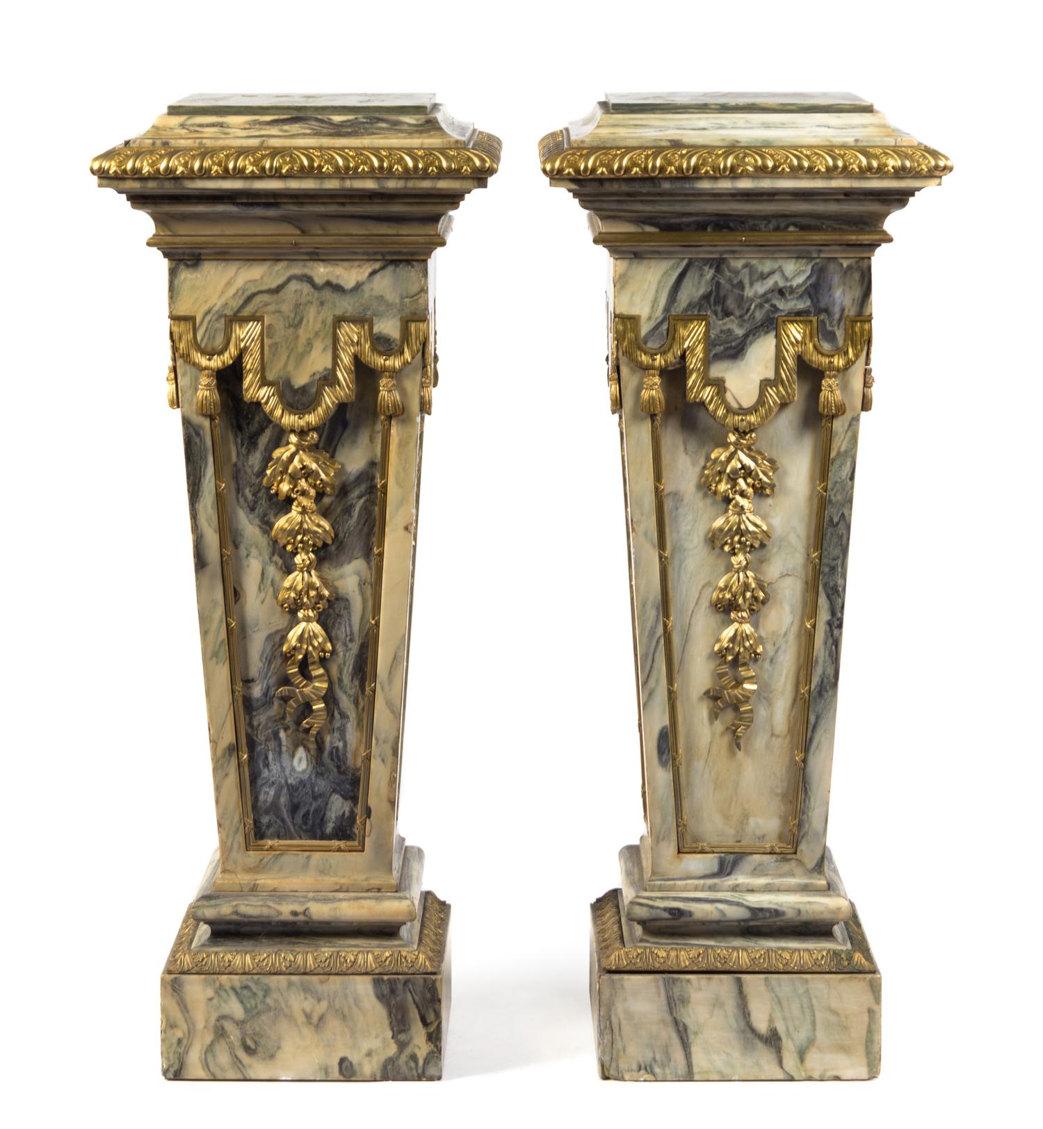 A Pair of Gilt Bronze Mounted Marble Pedestals