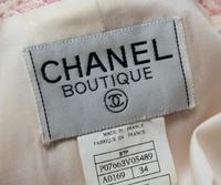 A Chanel Pink and White Tweed Jacket, Size 34.