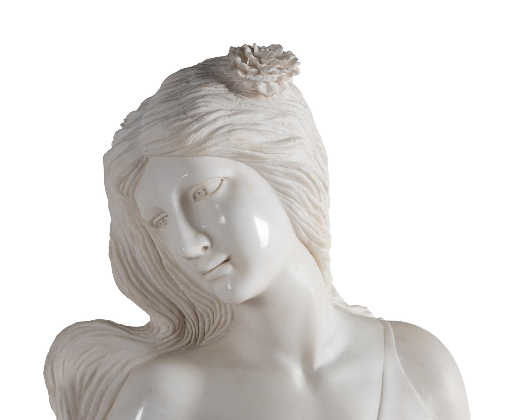 A Pair of Carved Marble 'Four Seasons' Figures