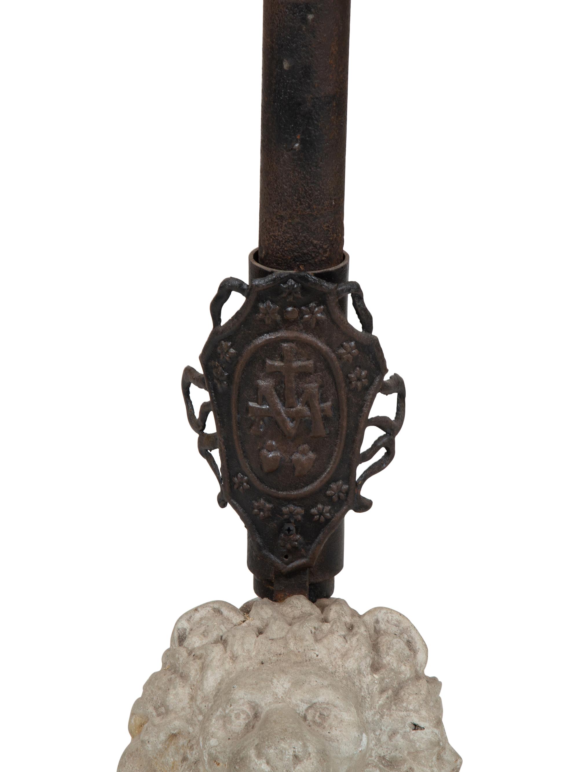 A Cast Stone Seated Lion with Iron Flag Pole in the Manner of Mizner