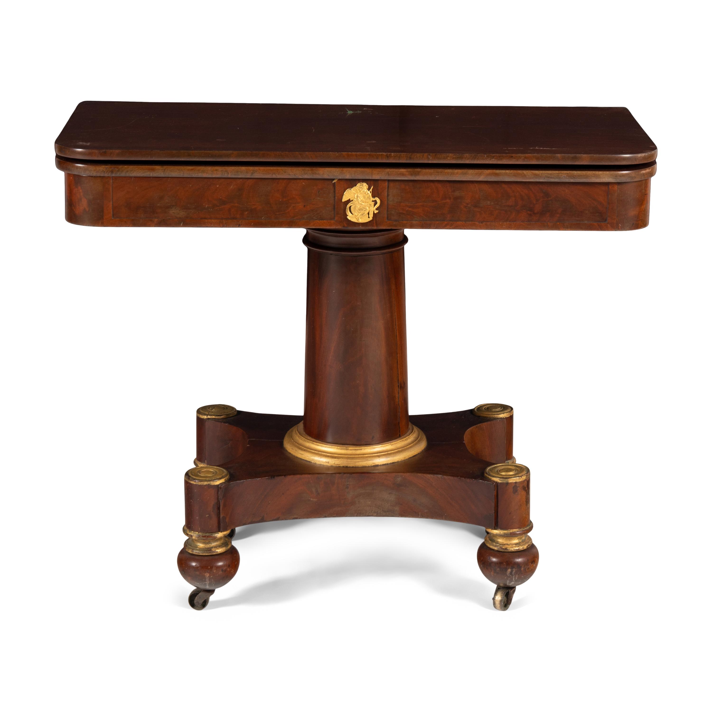 A Classical Mahogany and Parcel Gilt Game Table