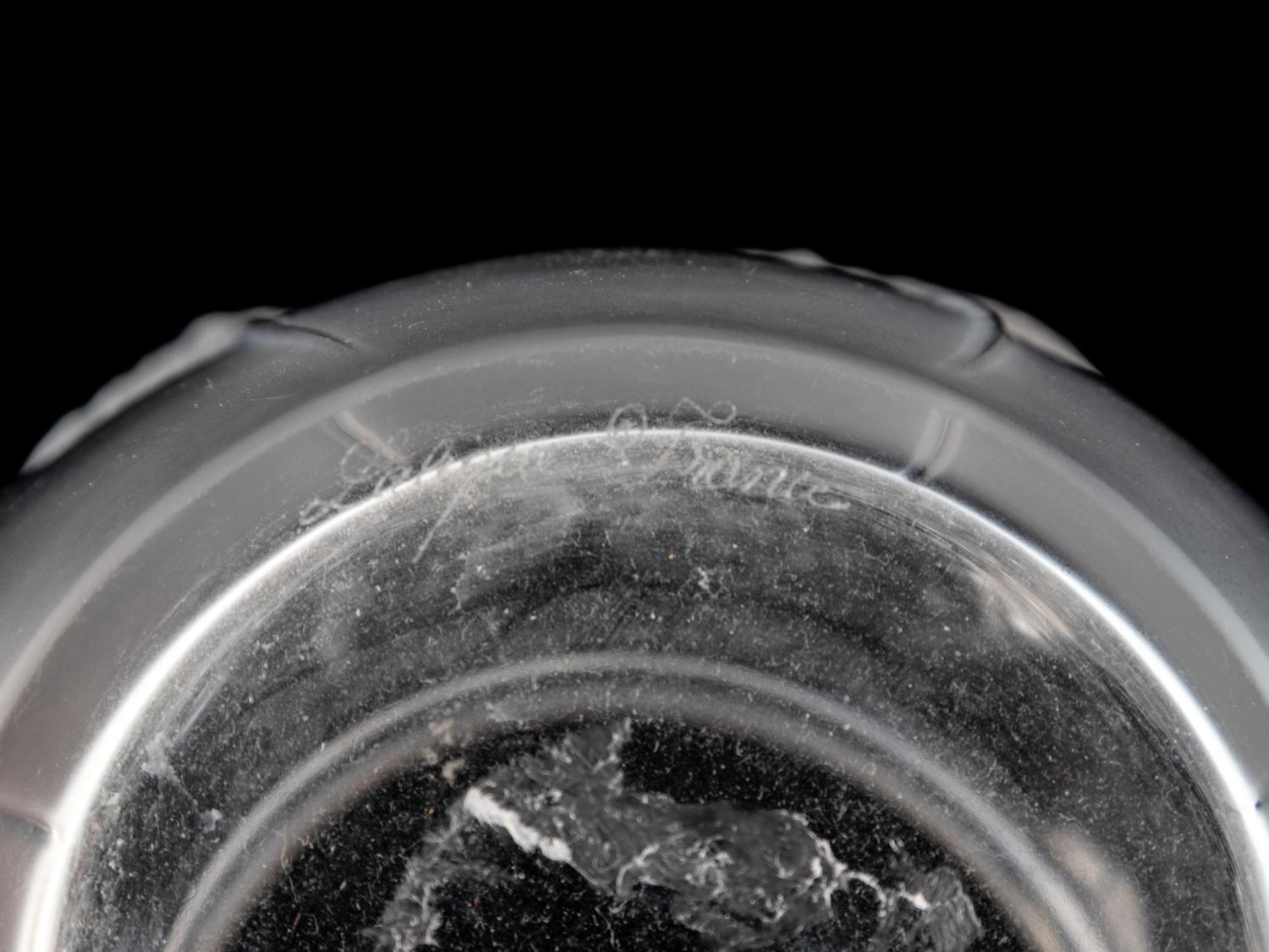 A Lalique Molded and Frosted Glass Bali Vase