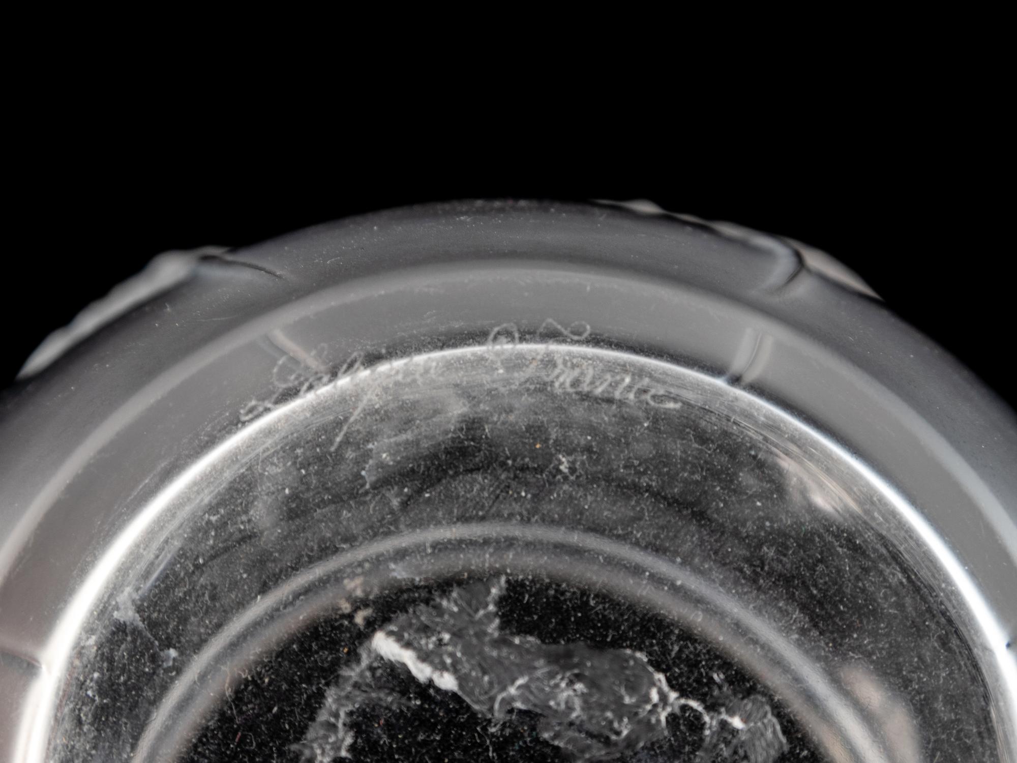 A Lalique Molded and Frosted Glass Bali Vase