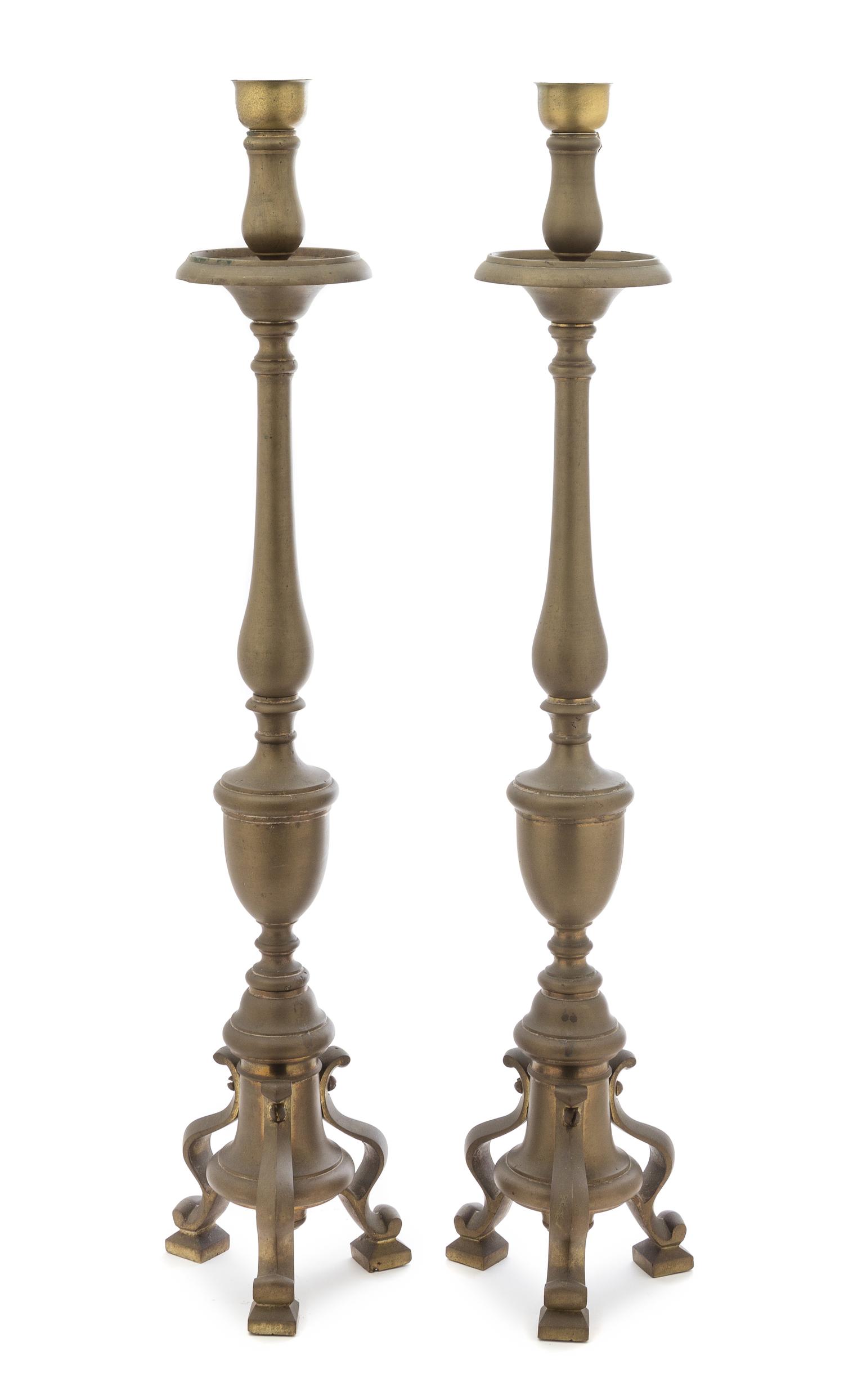 A Pair of Baroque Style Brass Pricket Sticks Height overall 37 inches. — 19TH CENTURY