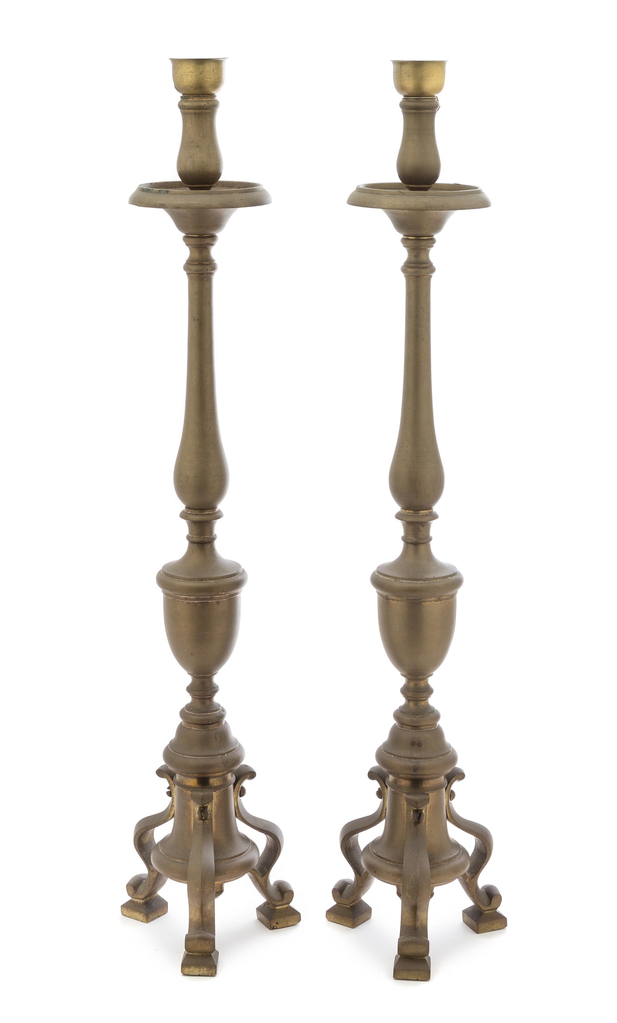 A Pair of Baroque Style Brass Pricket Sticks Height overall 37 inches. — 19TH CENTURY