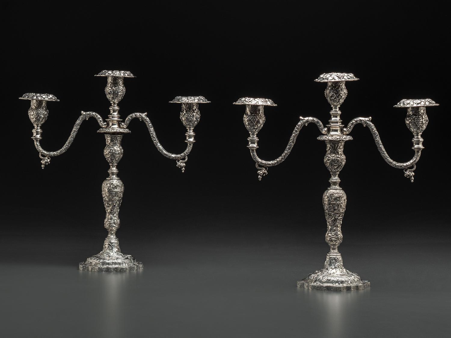 A Pair of American Repousse Silver Candelabra