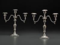 A Pair of American Repousse Silver Candelabra