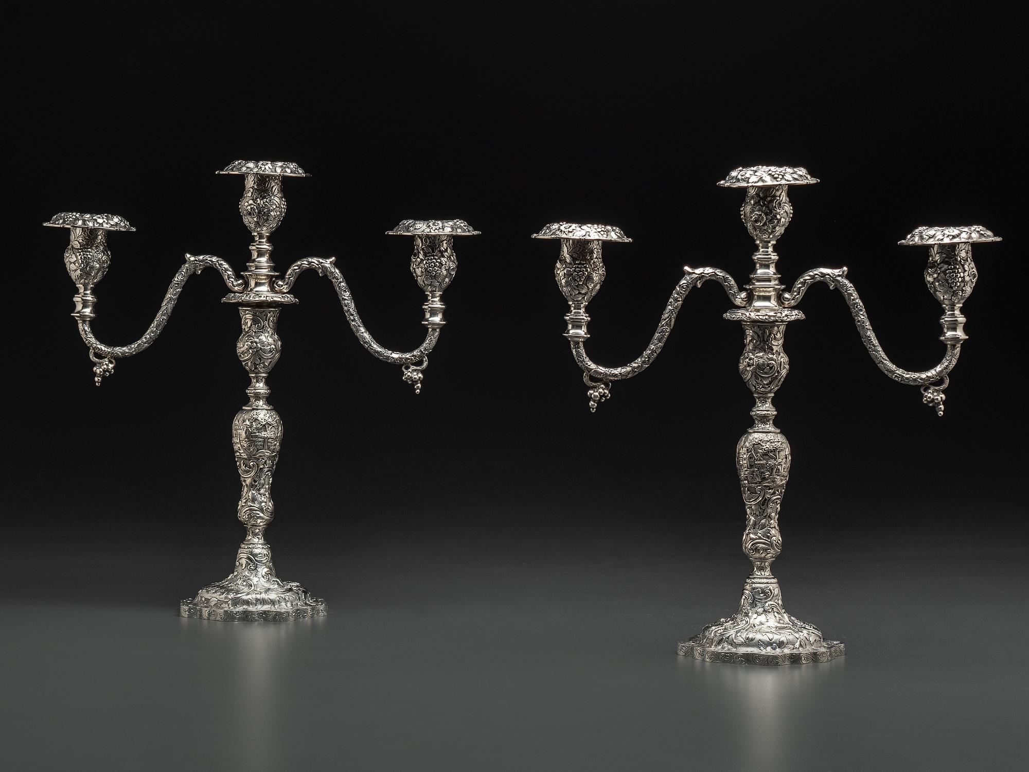 A Pair of American Repousse Silver Candelabra