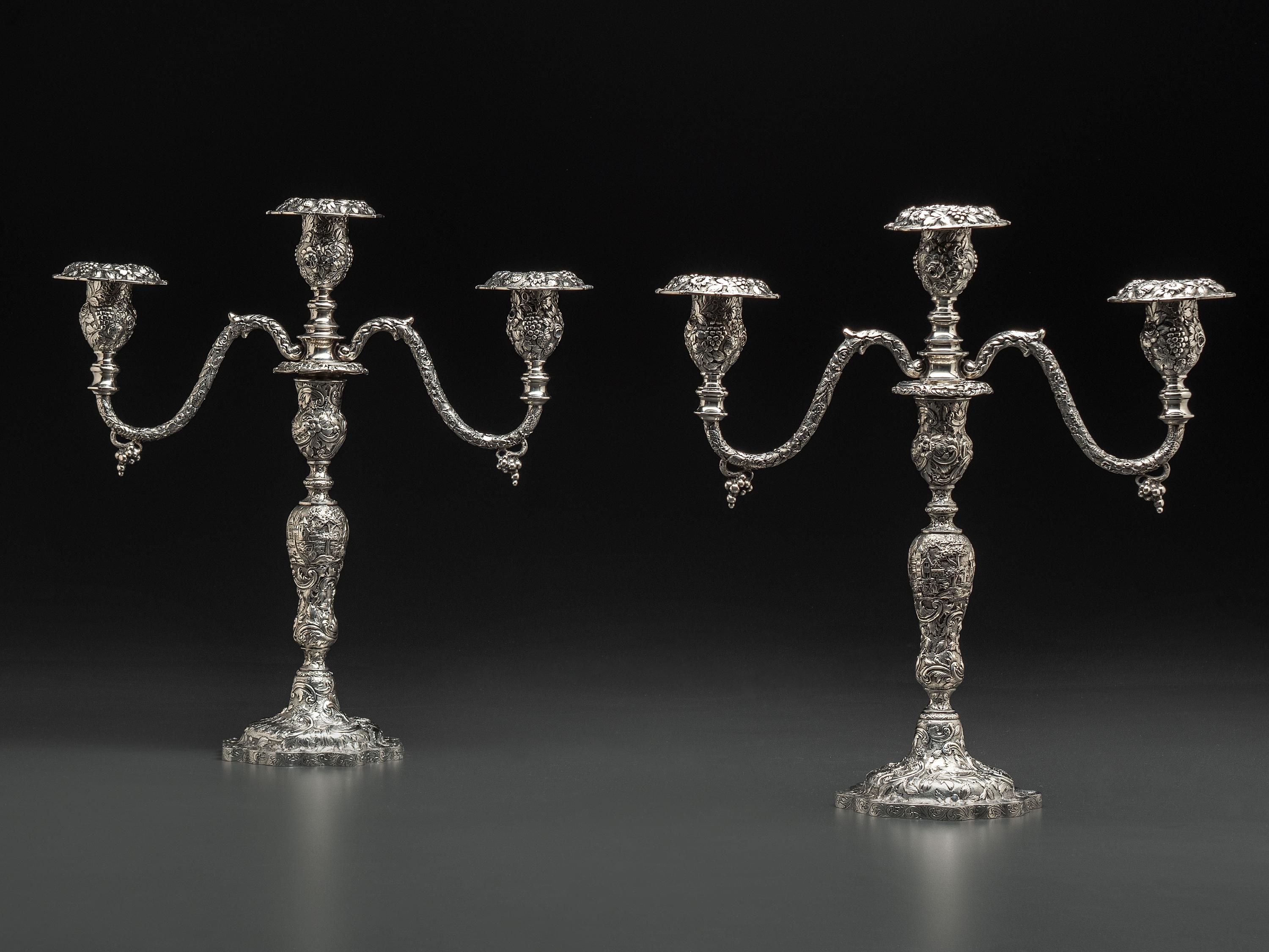 A Pair of American Repousse Silver Candelabra