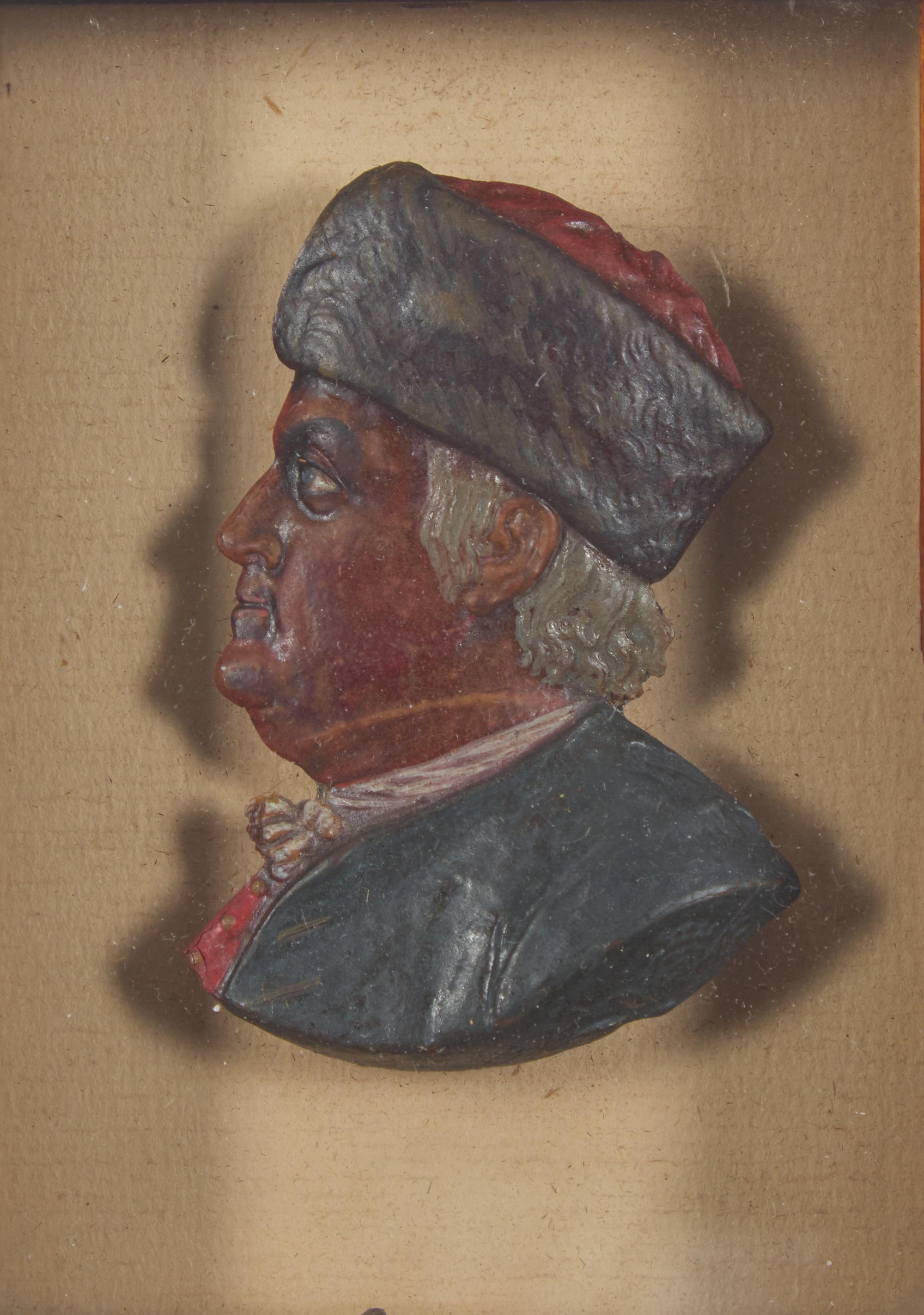 American School 19th Century, A Colored Wax Profile Portrait Bust of Benjamin Franklin with Fur Hat