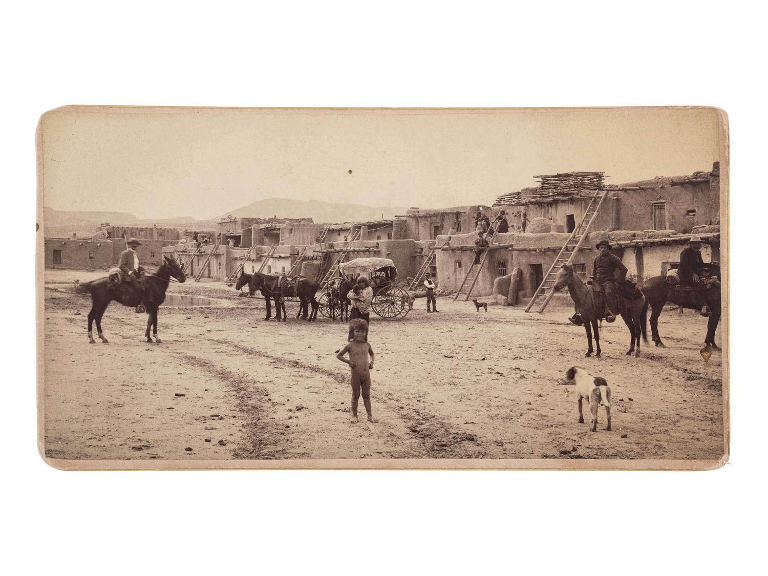 [NEW MEXICO]. Albumen photograph of Santo Domingo Pueblo Plaza. Albuquerque, NM: Mrs. Albright's Art Parlors, [ca 1880].