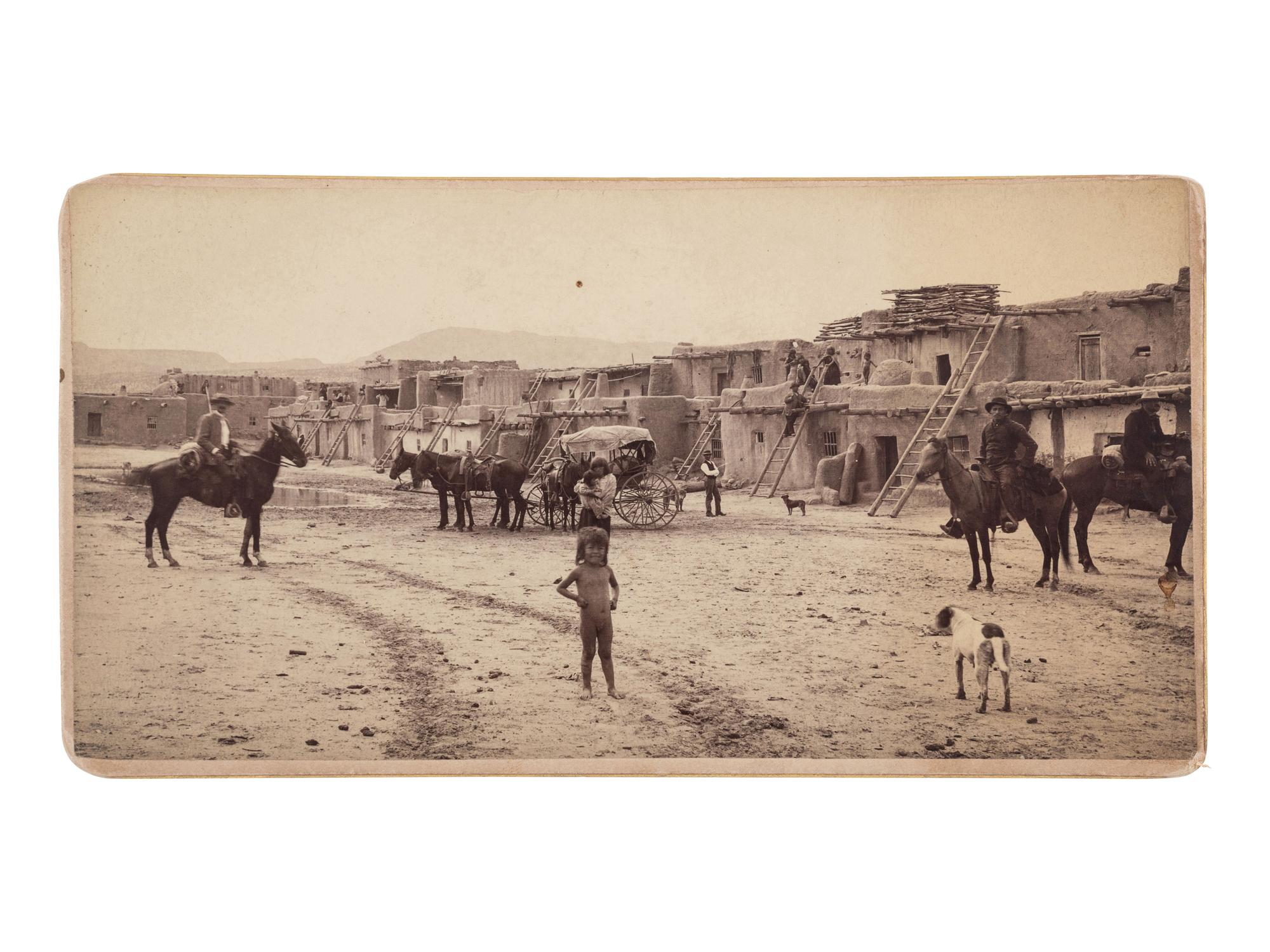[NEW MEXICO]. Albumen photograph of Santo Domingo Pueblo Plaza. Albuquerque, NM: Mrs. Albright's Art Parlors, [ca 1880].