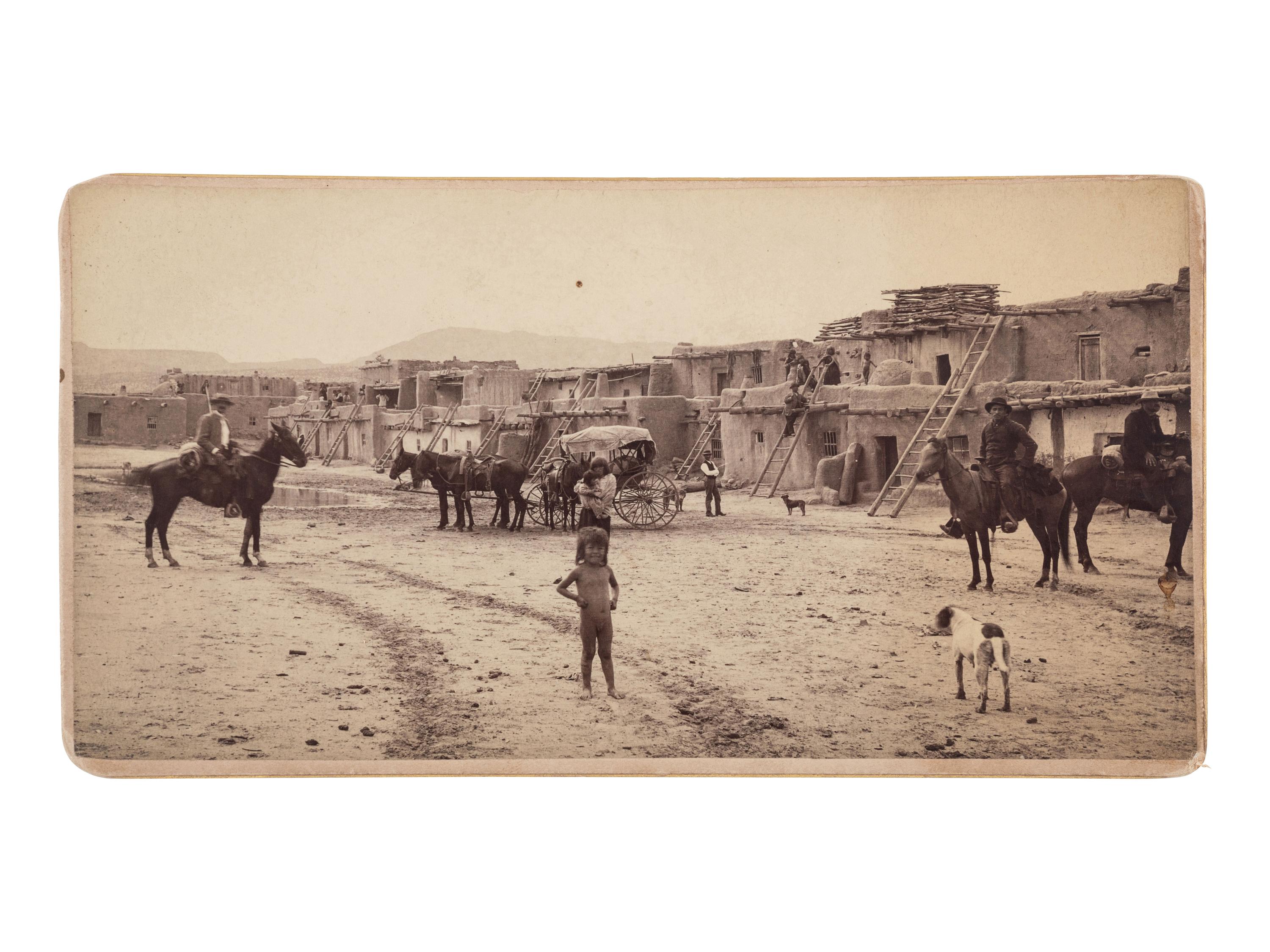 [NEW MEXICO]. Albumen photograph of Santo Domingo Pueblo Plaza. Albuquerque, NM: Mrs. Albright's Art Parlors, [ca 1880].
