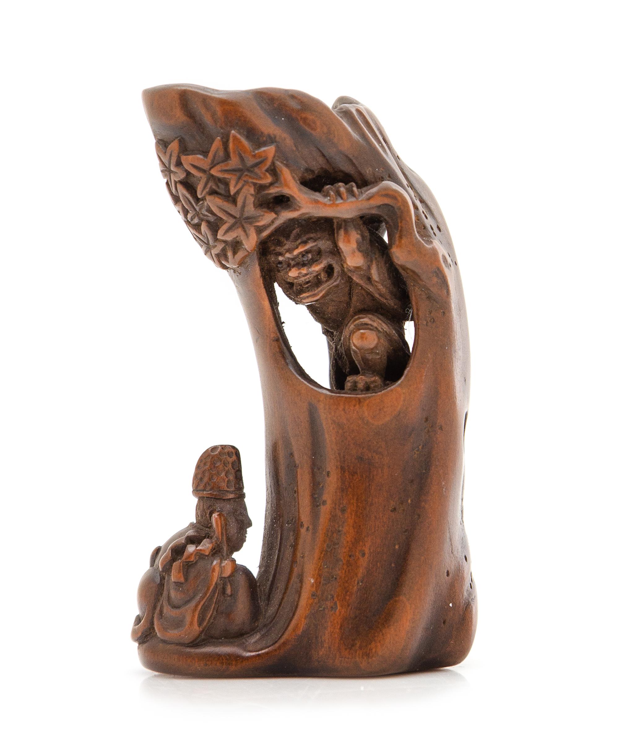 A Japanese Boxwood Netsuke Height 2 5/8 inches. — 19TH CENTURY, SIGNED MITSUHIRO WITH A KAO