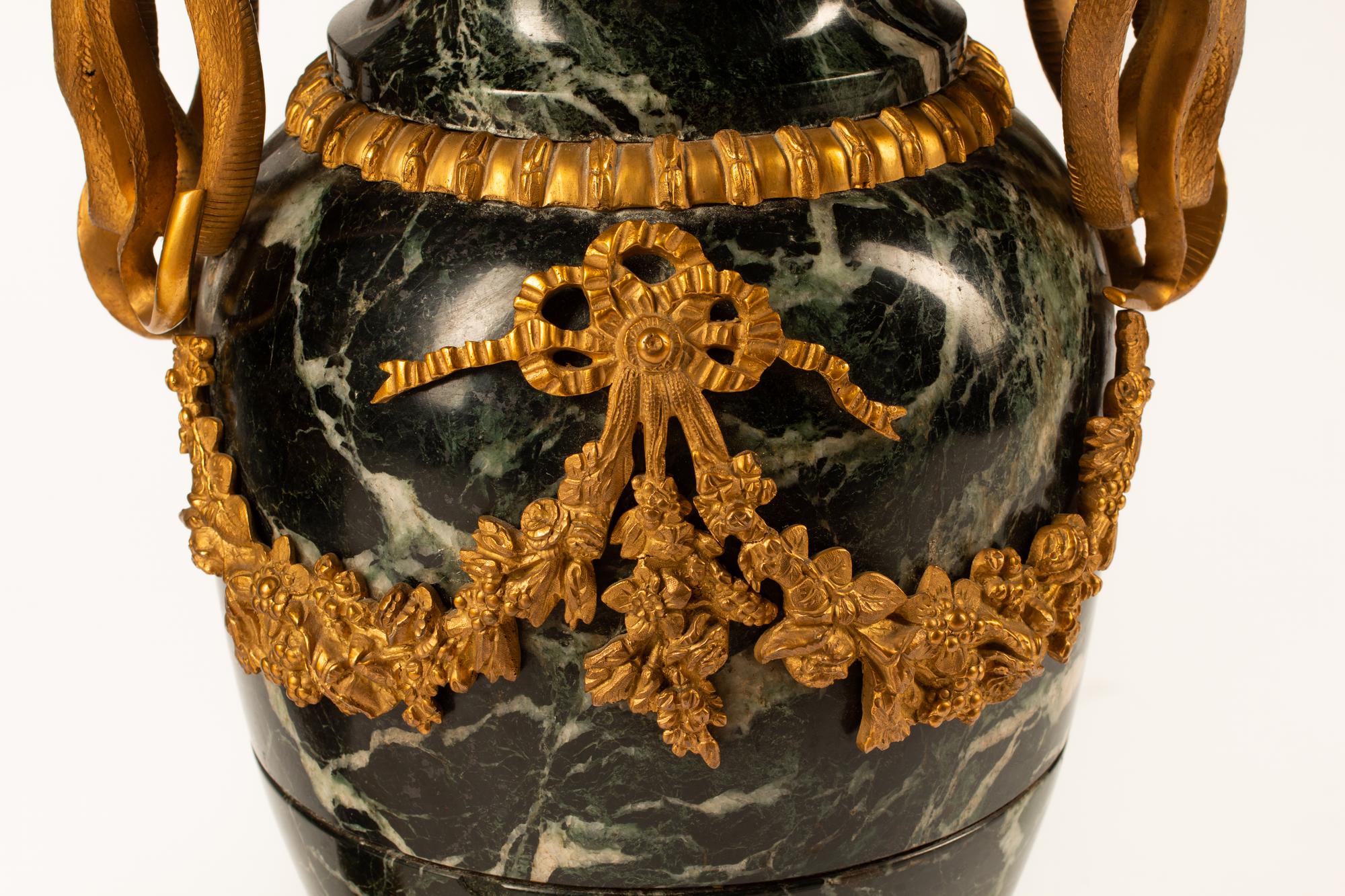 A Pair of French Gilt Bronze and Marble Urns