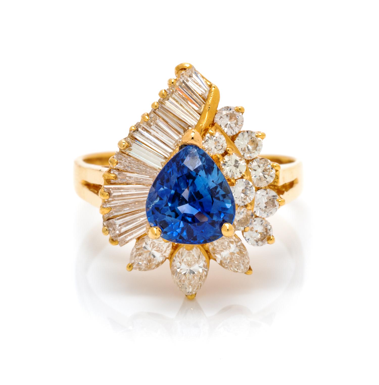 An 18 Karat Yellow Gold, Tanzanite and Diamond Ring, 3.70 dwts.