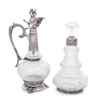 A Continental Silver Mounted Etched Glass Decanter and an English Silver-Plate Mounted Etched Glass Claret Jug