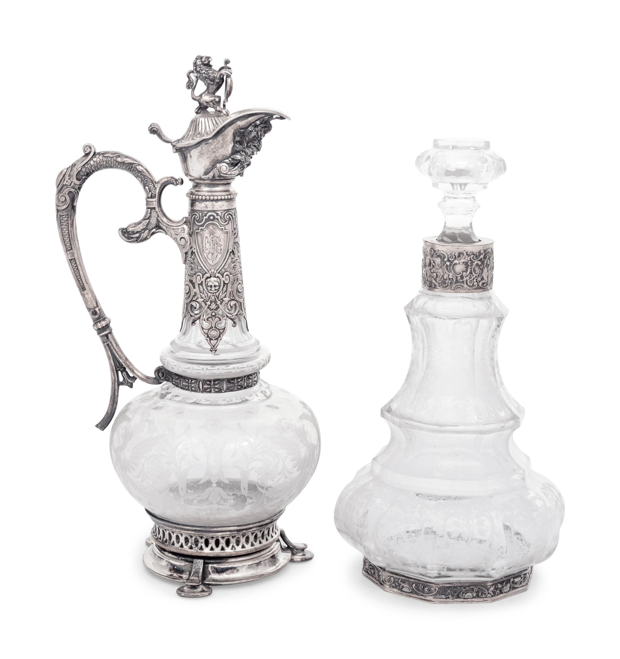 A Continental Silver Mounted Etched Glass Decanter and an English Silver-Plate Mounted Etched Glass Claret Jug