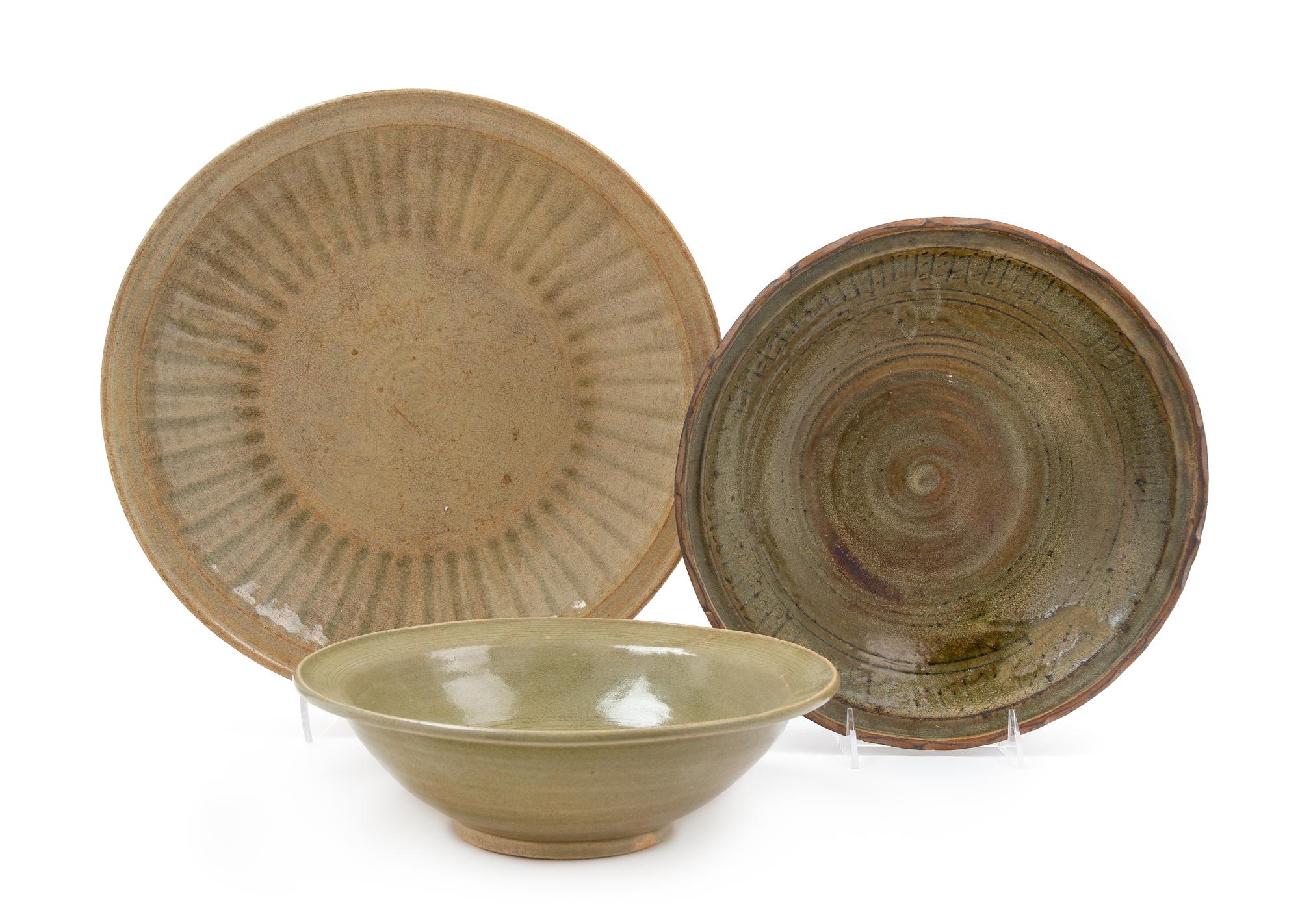 Three Thai Celadon Glazed Porcelain Chargers Diameter of largest 14 inches. — 15TH/16TH CENTURY