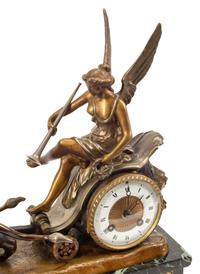A French Bronze and Marble Clock Garniture