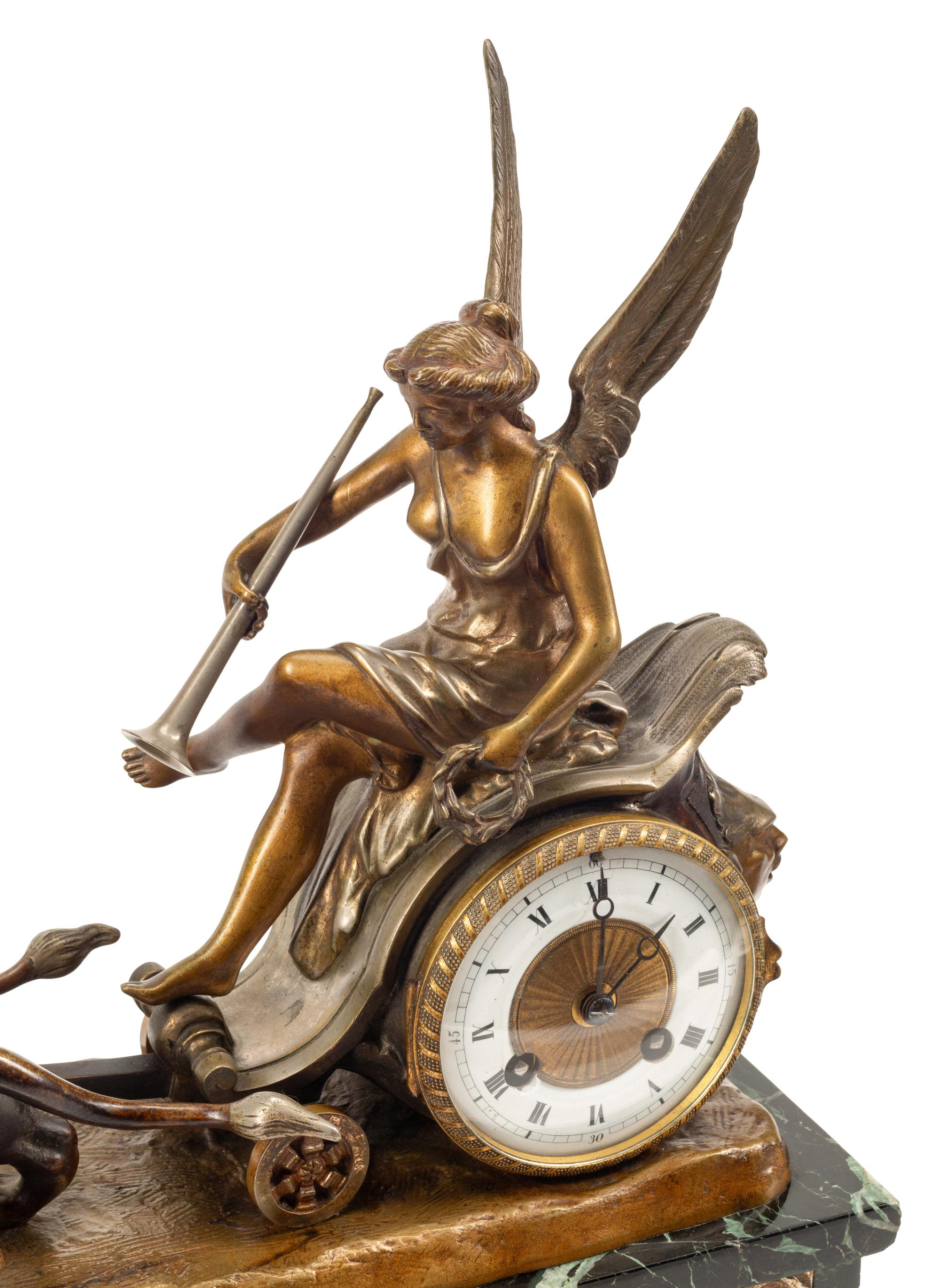 A French Bronze and Marble Clock Garniture