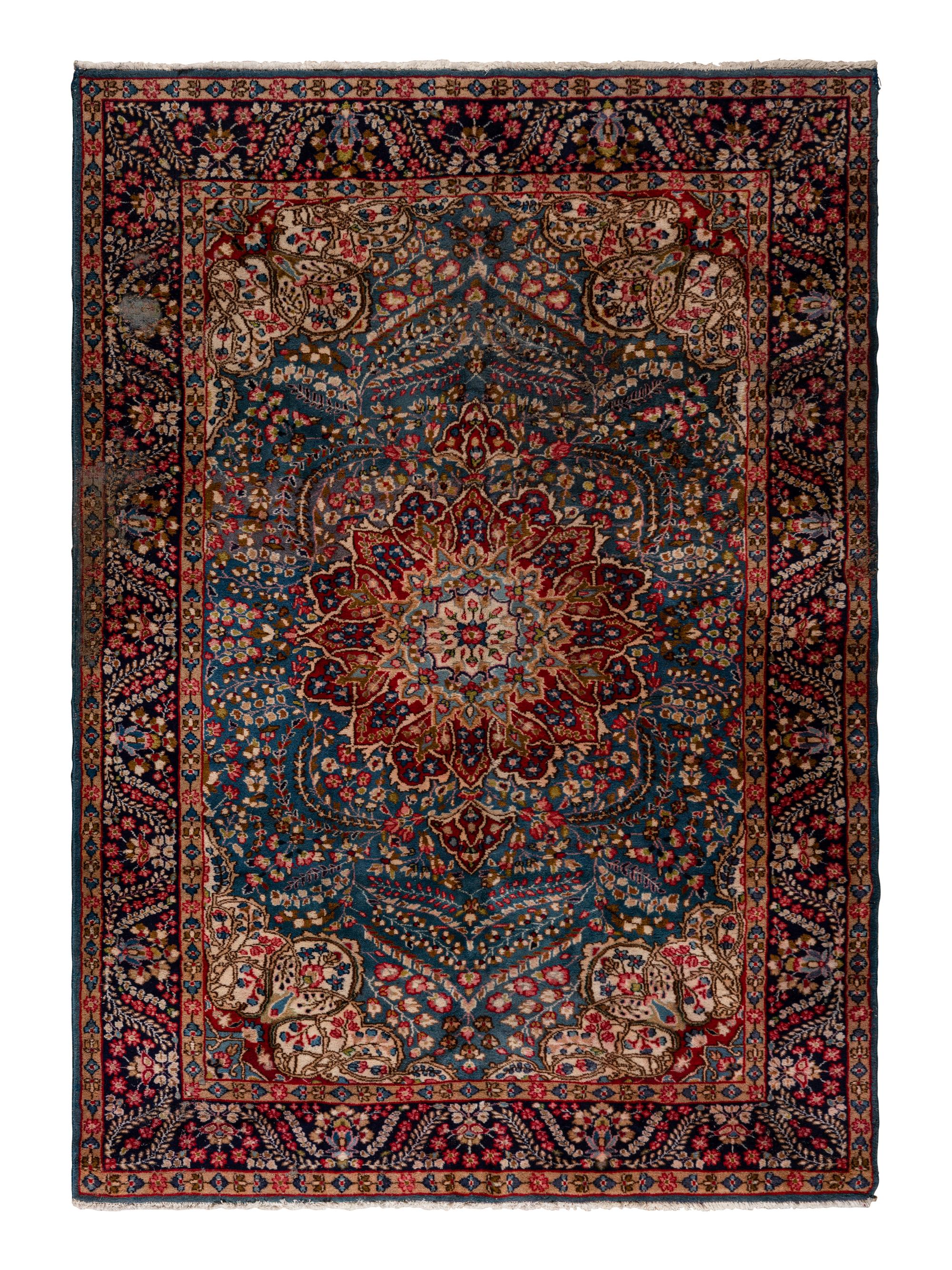 A Kirman Wool Rug