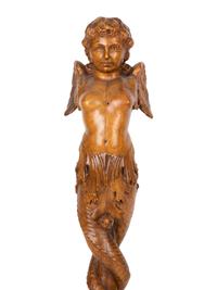 A Pair of Italian Carved Walnut Putti on Fluted Bases — 18TH/19TH CENTURY