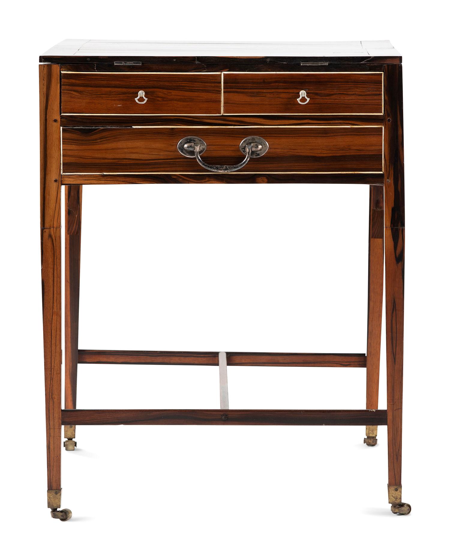 A Regency Ivory Inlaid and Silver Mounted Calamander Campaign Desk