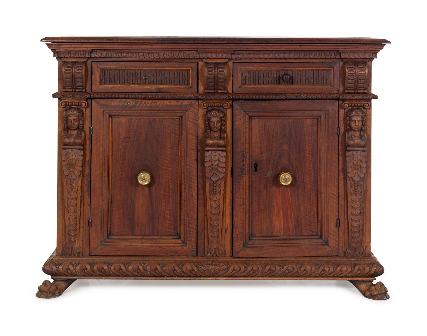 An Italian Renaissance Carved Walnut Cabinet