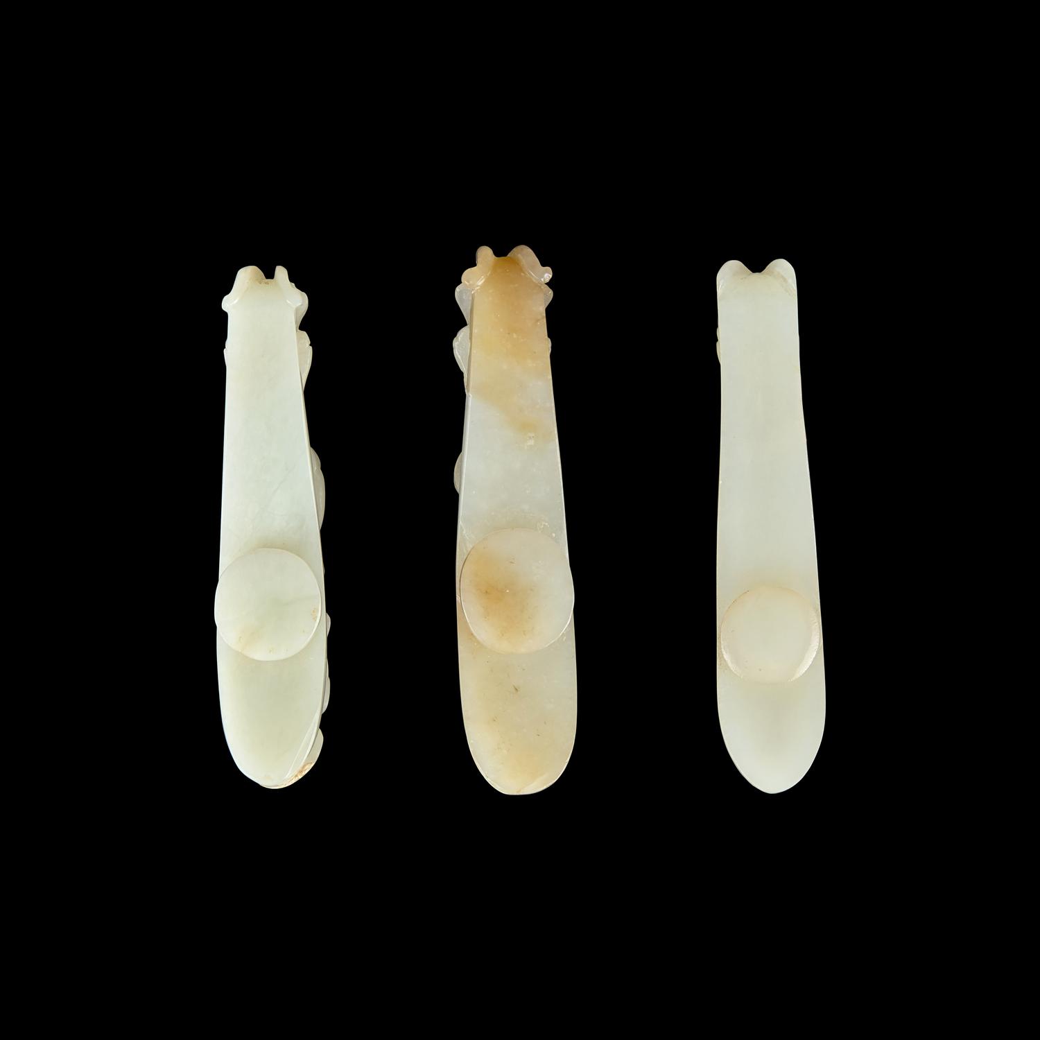 Three Greyish White Jade 'Dragon' Belt hooks, Qing Dynasty 清 灰白玉龍鈎三枚