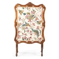 A Carved Victorian Fire Screen in Walnut