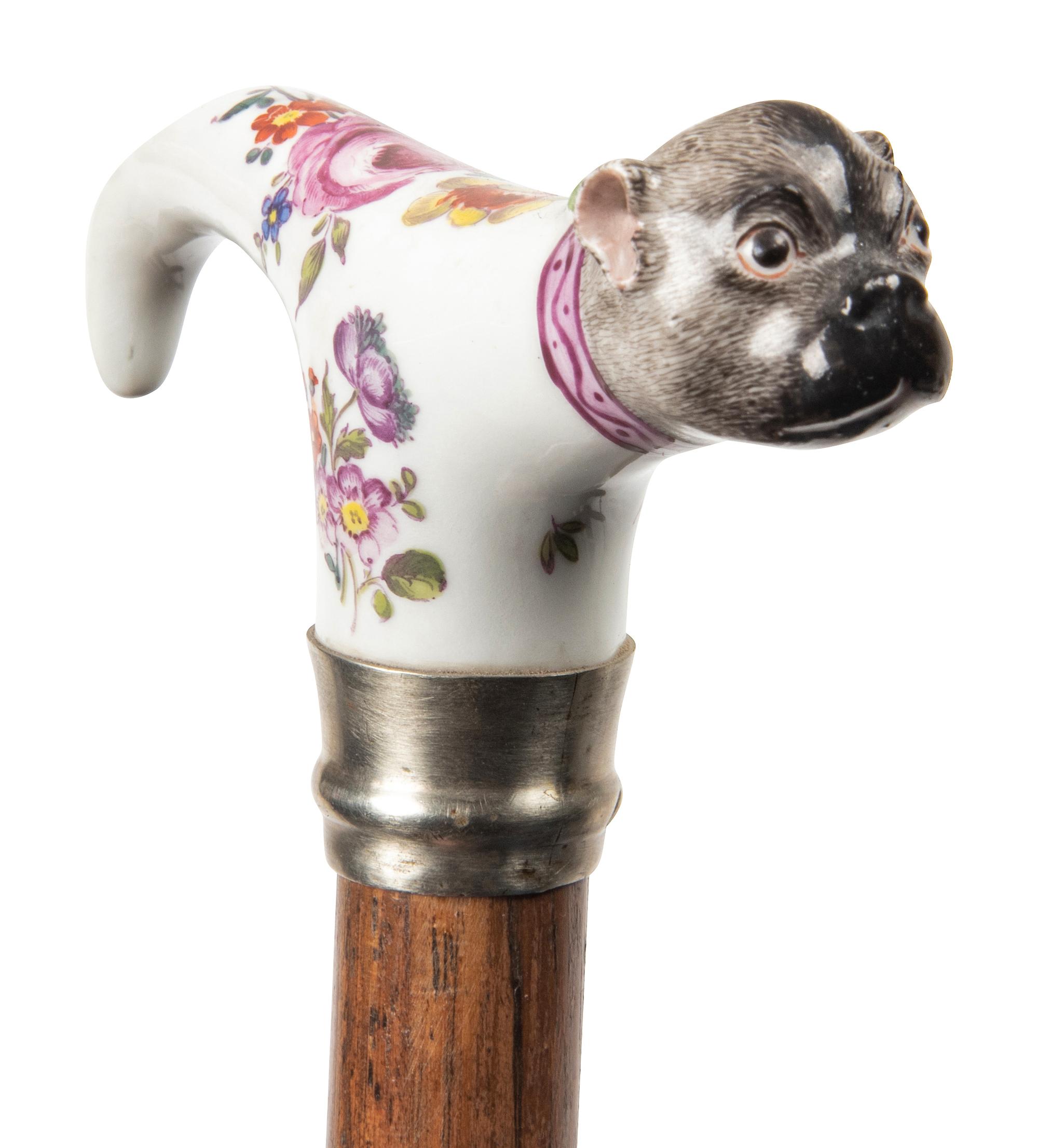 A German Porcelain and Silvered Metal Mounted Walking Stick